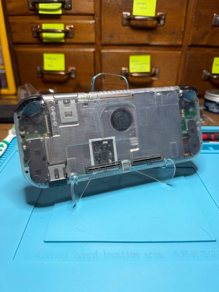 Transparent Nintendo Switch Lite with PICOfly modchip install.